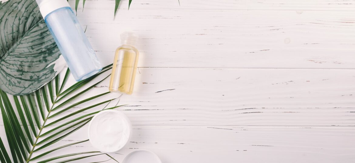 top-view-tropical-leaves-with-beauty-tools-cosmetics top-view-tropical-leaves-with-beauty-tools-cosmetics